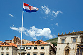 Croatia Flag flying in front of the Sponza Palace, Dubrovnik